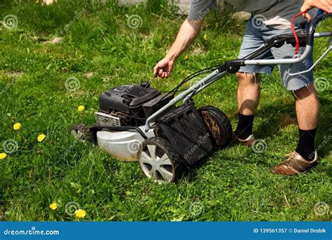 Starting An Lawn Mower To Mow Lawns Stock Image Image Of Cultivation Starting An Lawn Mower To Mow Lawns Stock Image Image Of Cultivation